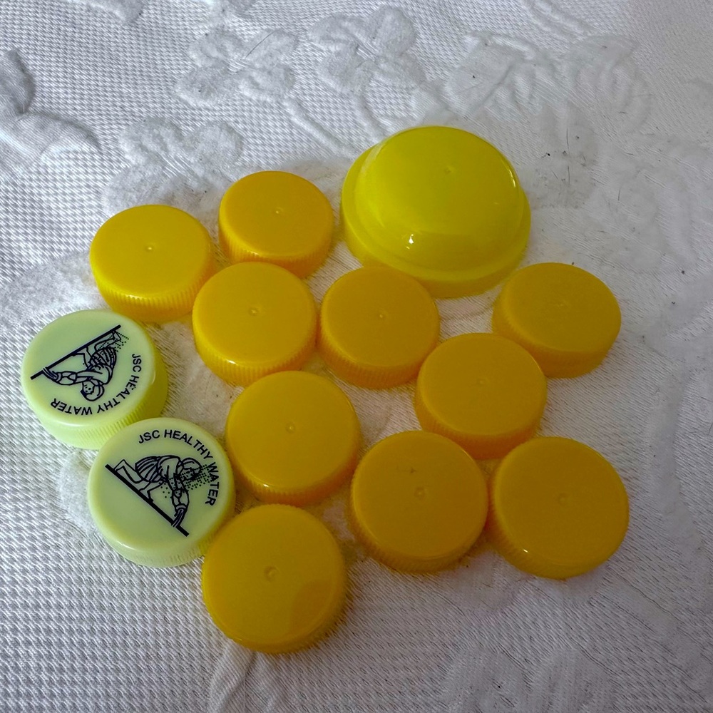 Yellow Plastic Bottle Caps lot of 13 with container Arts and Crafts